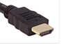 HDMI cable is wider. The metal connector is slightly angled on the sides.