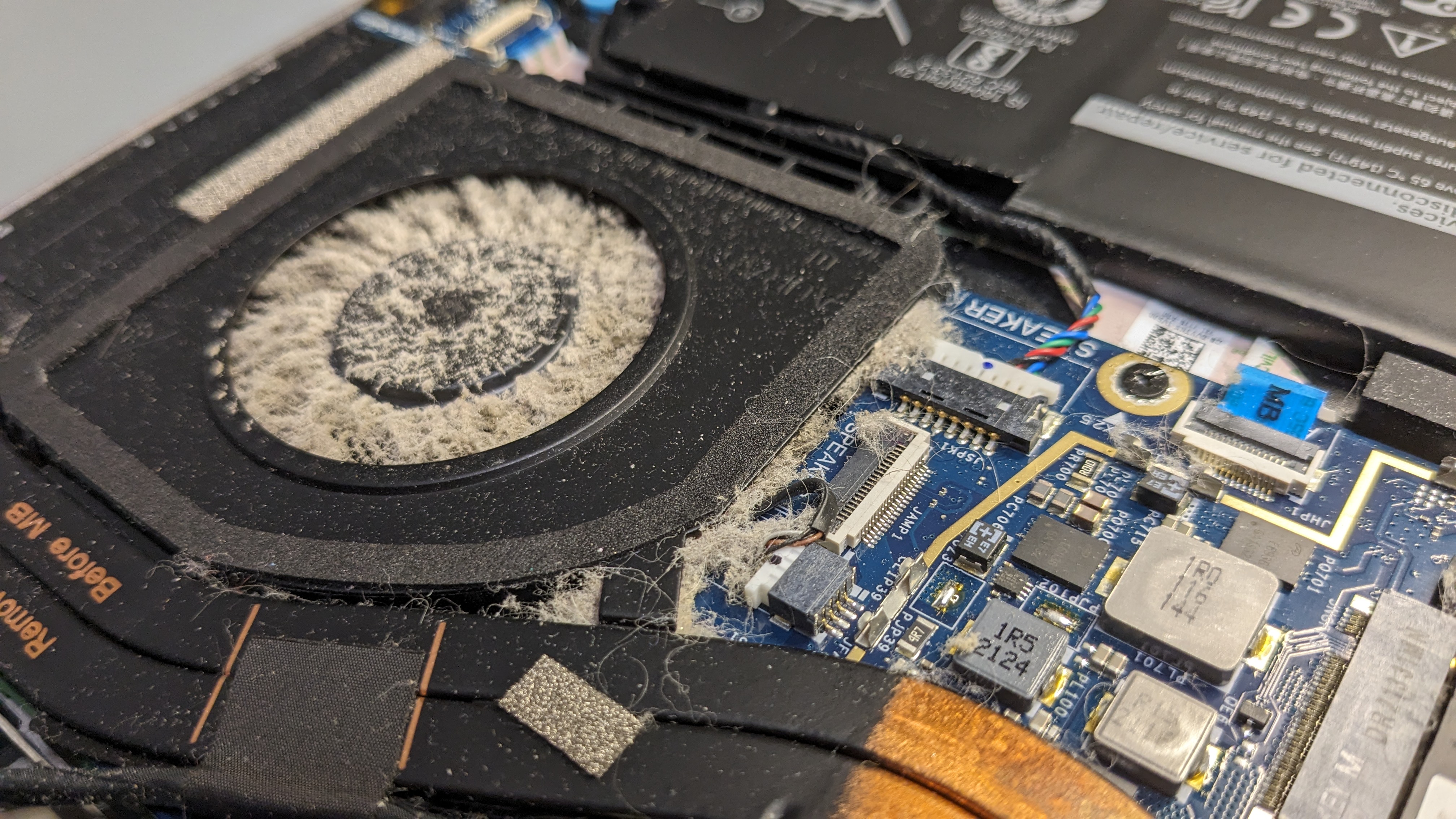 A clogged laptop fan from a Cornell-owned device