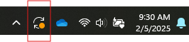 Windows update icon (orange dot within a circle made by two arrows ) in the taskbar system tray.