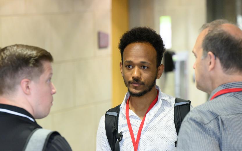 three colleagues discuss service management topics